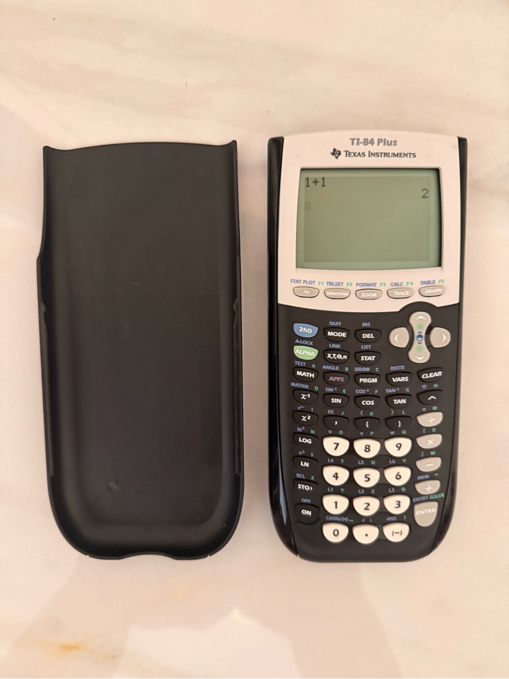 Texas Instruments TI-84 Plus Graphing Calculator — Black and White